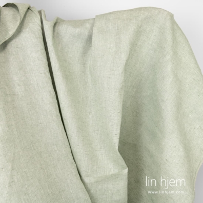 Bredt grønnaktig linstoff.