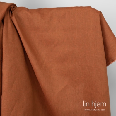 Bredt oransje linstoff.