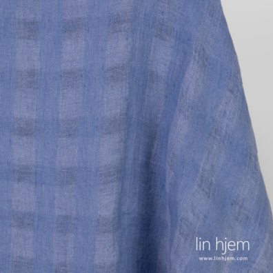 Gjennomsiktig blått vasket linstoff.