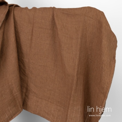 Vasket brunt stripete linstoff.