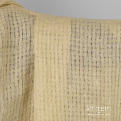 Gulaktig vasket 100% linstoff.