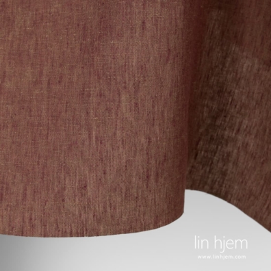 100% linstoff i grønnaktig lilla farge.