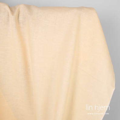 Cream farget linstoff.