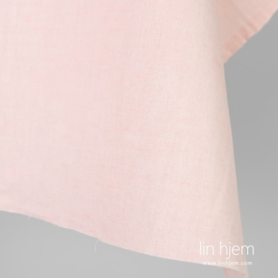Melange bomulls-lin stoff i rosa farge.