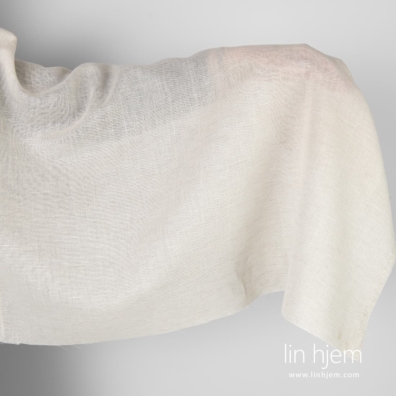 Gjennomsiktig hvitt-grått halvlin stoff.