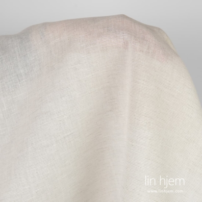 Grått-hvitt halvlin stoff.