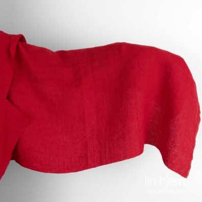 Vasket rødt linstoff