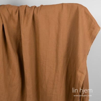 Linstoff i leirebrun farge, vasket