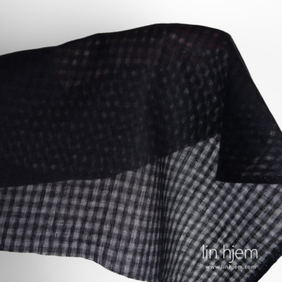 Svart linstoff i gjennomsiktige ruter