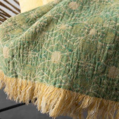 Jacquard grønn lin-bomullspledd med blomster og frynser på kortkantene