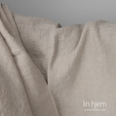 Bredt naturgrå linstoff, vasket, for sin mykhet og skånsomhet