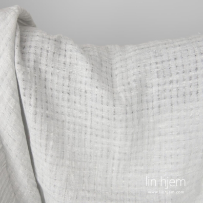 Spesielt vasket for å gjøre stoffet mykt, skånsomt. Krymper ikke. Overflaten er litt ujevn