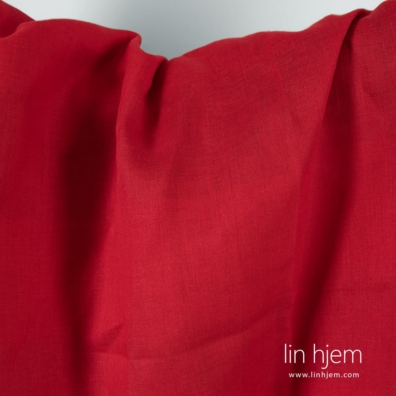 Tofarget rødt garn vevd i linstoff