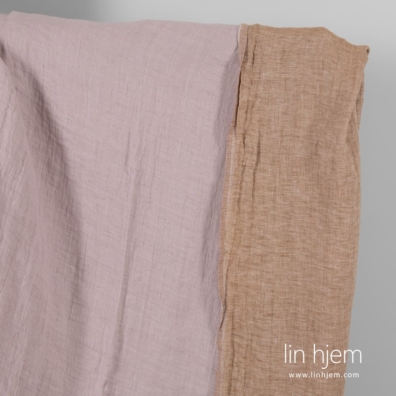 Dobbeltsidig linstoff i lilla og brune farger, vasket