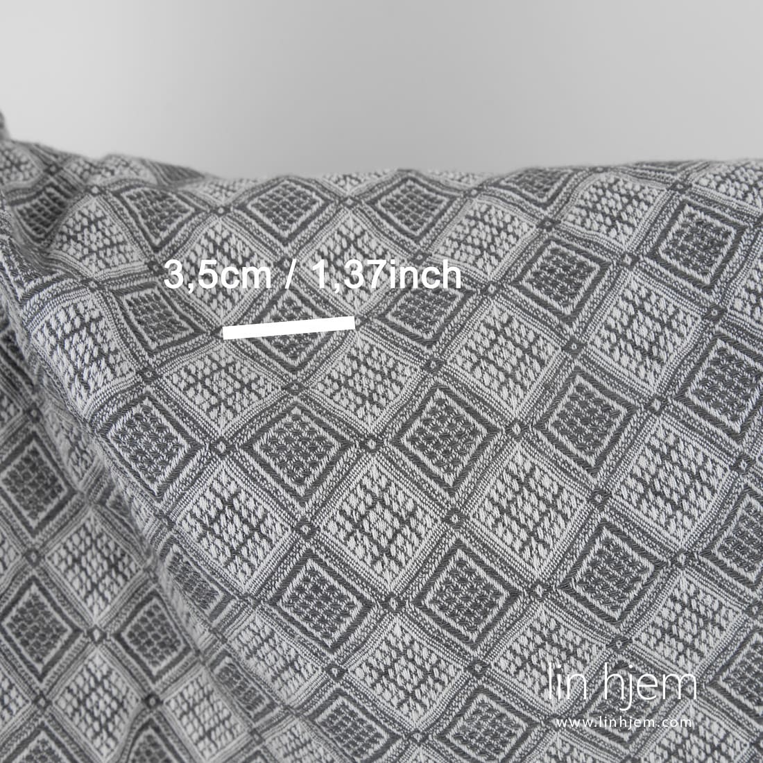 Lin bomullsstoff med diamanter vevd av hvitt og mørkegrått (antrasitt) garn