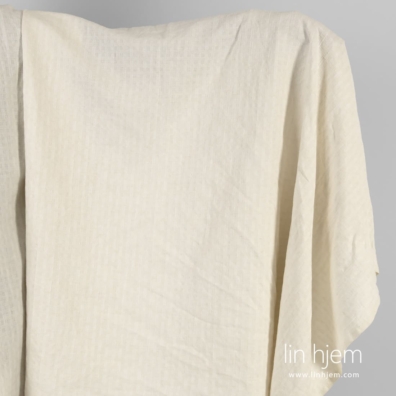 Halvlin stoff kremfarget mønstret vasket