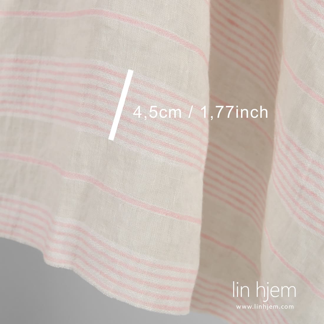 Linstoff med striper vevd av melkehvit, lys krem og rosa garn