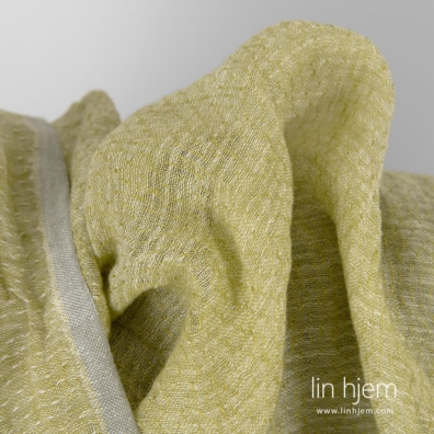 Lett linstoff gulgrønn vasket egnet til å sy gardiner og skjerf