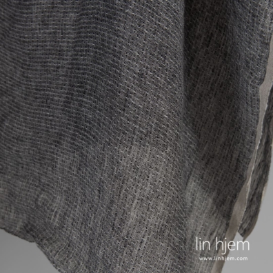 Lett linstoff svart og hvit vasket egnet til å sy gardiner og skjerf