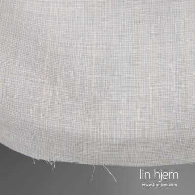 Linstoff gråhvitt 280cm bredt vevd av melkehvit (gulhvit), blågrå og lysegrå garn, melange