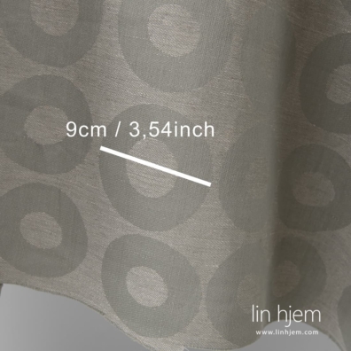 Lin-bomull stoff med sirkler vevd av grønnlig grå og og naturlig grått (ufarget) garn