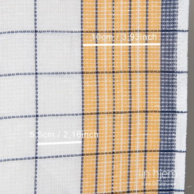 Halvlinstoff snøhvit med gule og blå ruter egner seg til å sy kjøkken- og badehåndklær