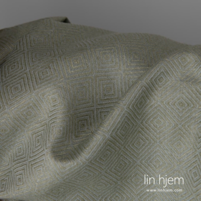 Halvlin stoff med romber vevd av blekgrønne og blågrå garn