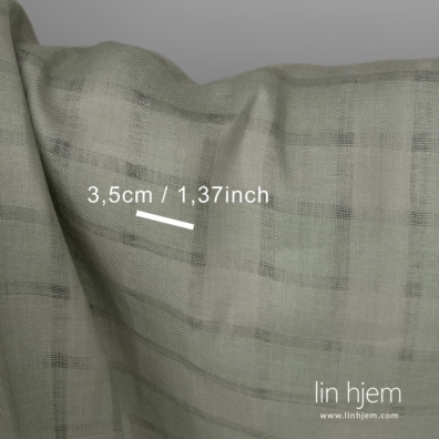 Linstoff grønt med gjennomsiktige striper vevd i twill mønster