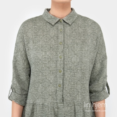 JUDIT FLORA mosefarget linkjole vevd av gul hvitt og mørkegrønt/mose garn, melange, jacquard med blomster mønster