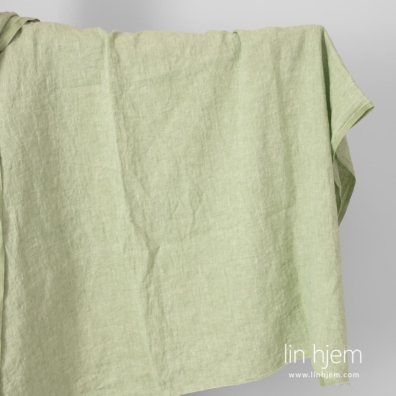 Linstoff hvit-grønn vasket egner seg til å sy klær og hjemmetekstiler