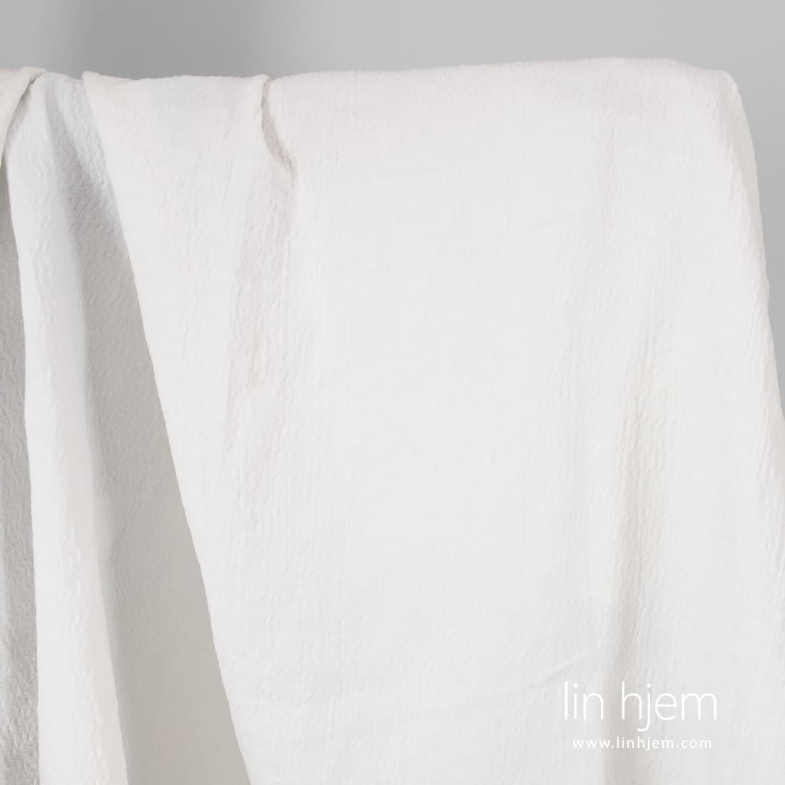 Lin-bomullsstoff knallhvitt mønstret vasket, 140cm bredt