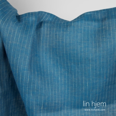 Linstoff blått med gule striper for å sy klær, hjemmetekstiler