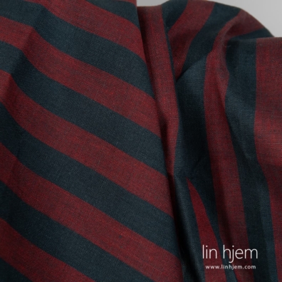 Linstoff med blå og røde striper for å sy klær, hjemmetekstiler