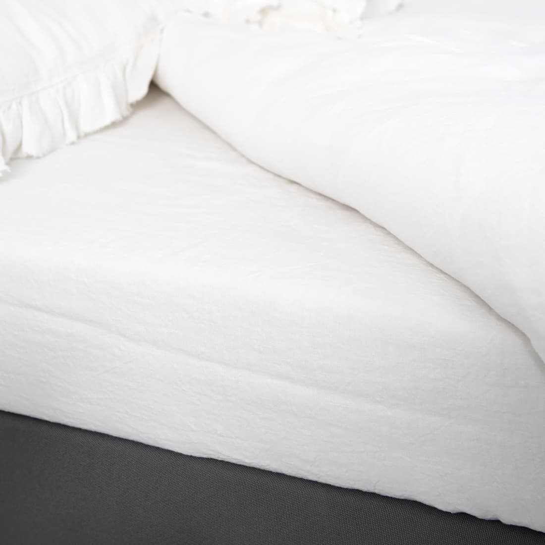 Melkehvitt laken / stretchlaken KOKOS