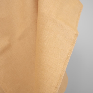 Linstoff vevd av tofarget brunlig-gult (hvete og ingefærfarget) garn, melange