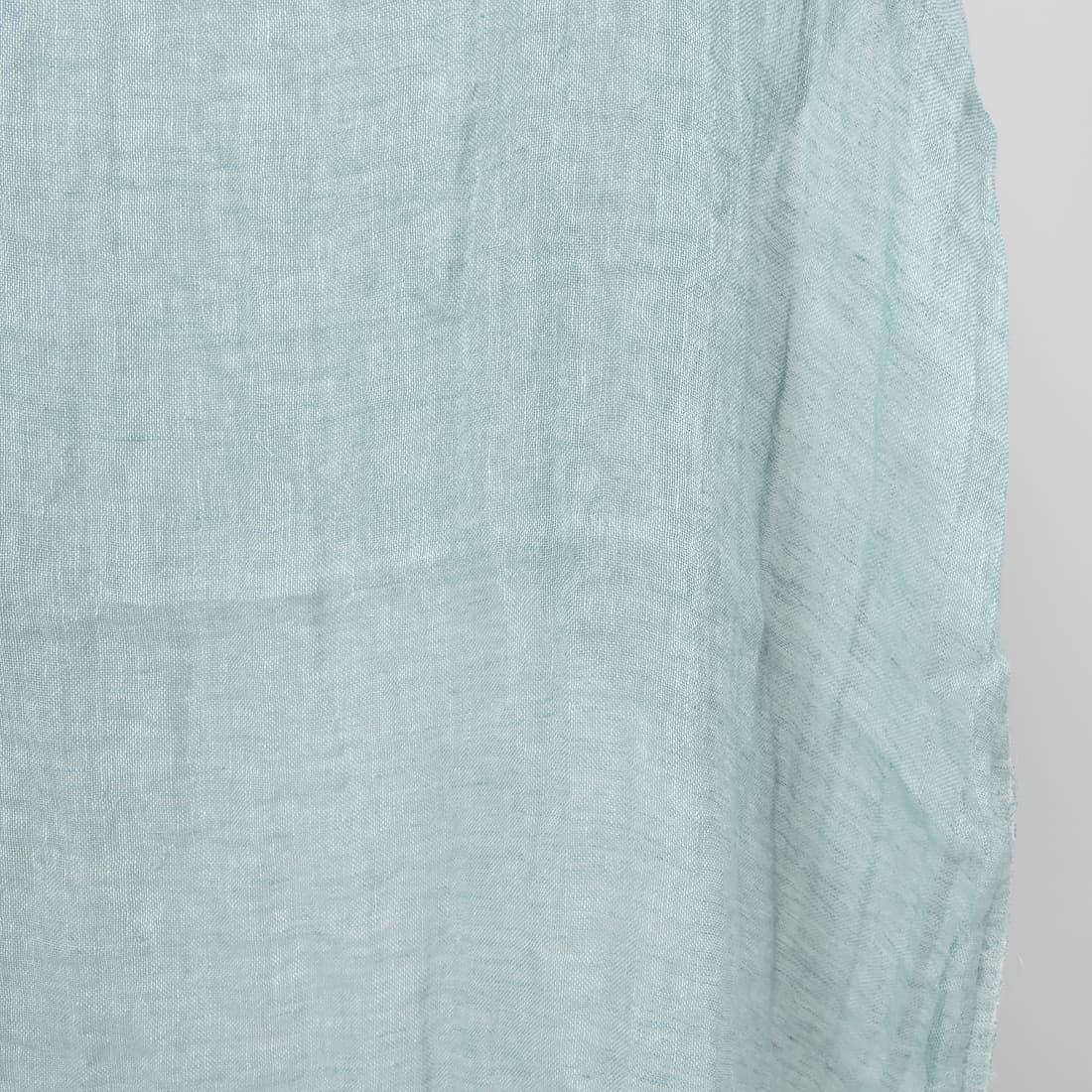 Linstoff gjennomsiktig vevd av mint og blågrønt garn, melange, vasket