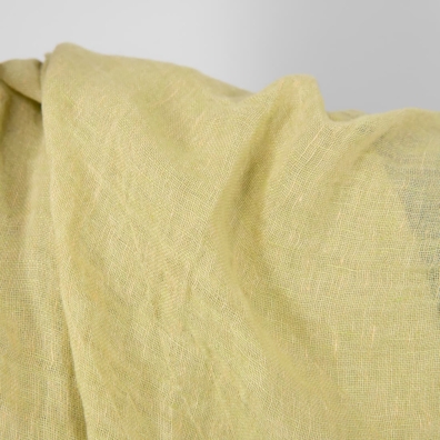 Linstoff gjennomsiktig vevd av lysegrønt og brungult garn, melange, vasket