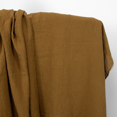 Linstoff gyllenbrunt bredt vasket