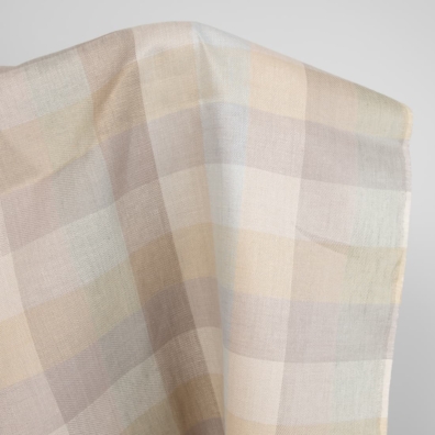 Linstoff med brune og grønnlige ruter for å sy klær og hjemmetekstiler