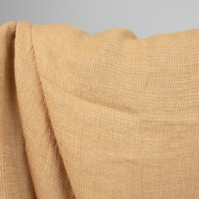 ”Vaffel” linstoff vevd av tofarget brunlig-gult (hvete og ingefærfarget) garn, melange, vasket