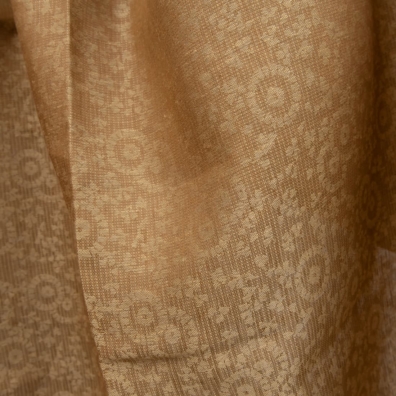 Linstoff jacquard vevd av gyllenbrunt og ingefærfarget (brungult) garn