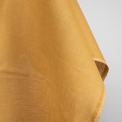 Linstoff vevd av sennepsfarget (dyp gul) og ingefærfarget (brungult) garn, melange