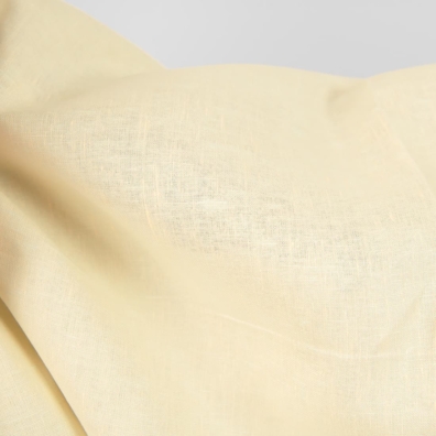 Gulgrønt linstoff for å sy klær og hjemmetekstiler