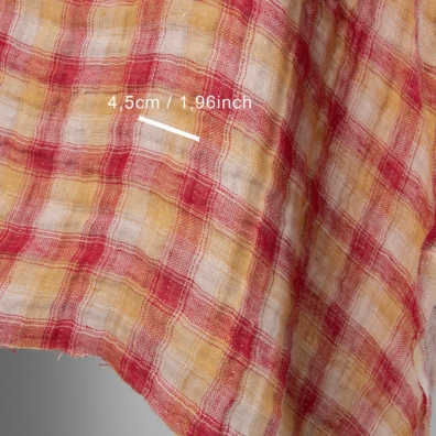 Tosidig dobbeltlag rutete linstoff vevd av knallrødt, brungult og beige garn, vasket