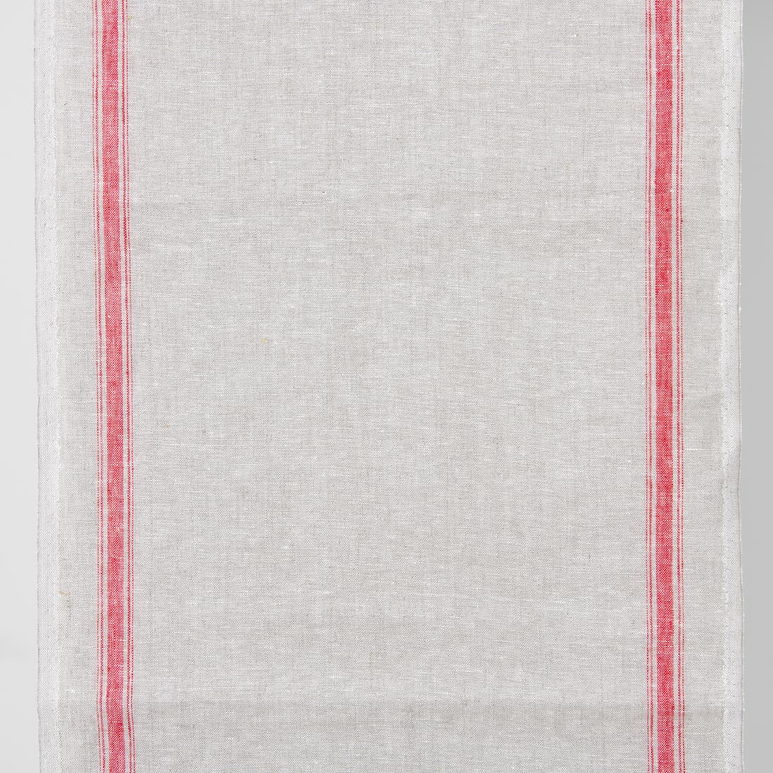 Lysegrått håndkle linstoff med røde striper