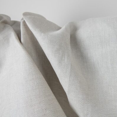 Beige linstoff i fiskebeinsmønster