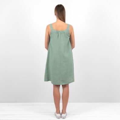 Grønnaktig linkjole med vakker rusjing i halsen bak