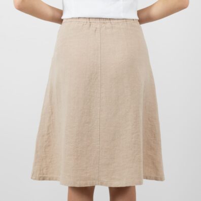 Lysebrunt linskjørt med elastisk linning bak, glidelås i siden