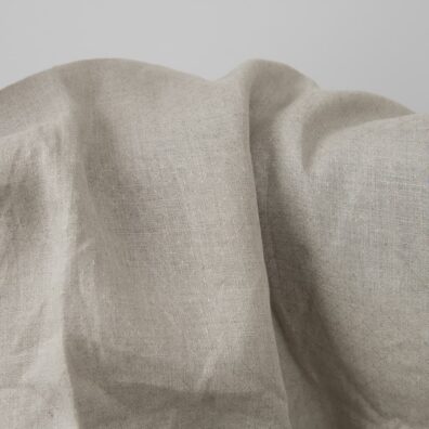 Naturgrått linstoff i diamantmønster