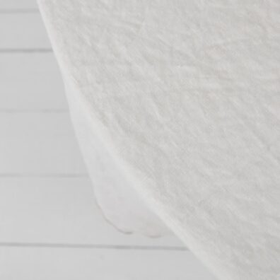 Rund melkehvit lin duk av spesielt vasket, mykt, skånsomt stoff